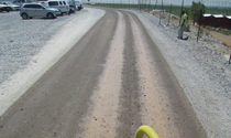 Treated haul road in an industrial yard